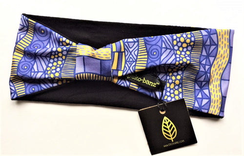 Soft and luxurious, yoga headband made from sustainable bamboo and performance lycra. Purple and gold geometric pattern weave their way around the headband.